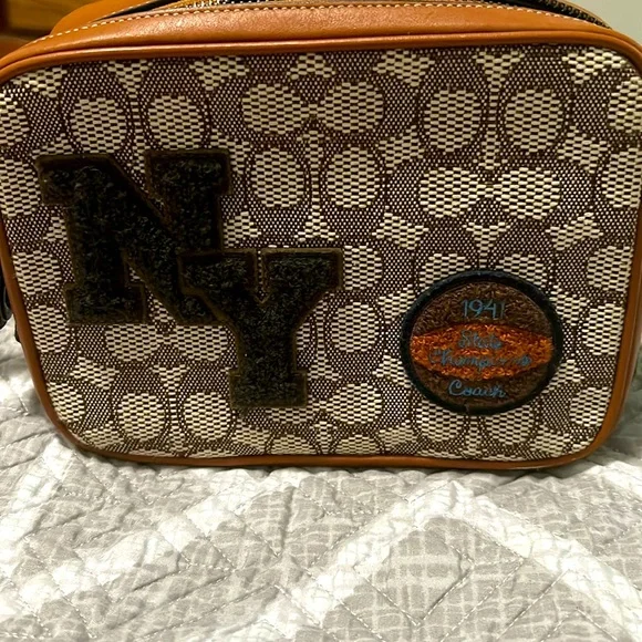 Coach Flight Bag 19 in signature jacquard w varsity patches